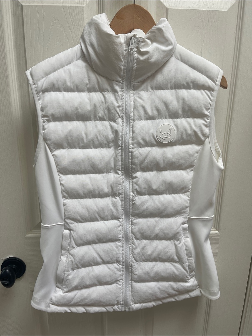 Women's White Quilted Sleeveless Vest with Subtle Logo